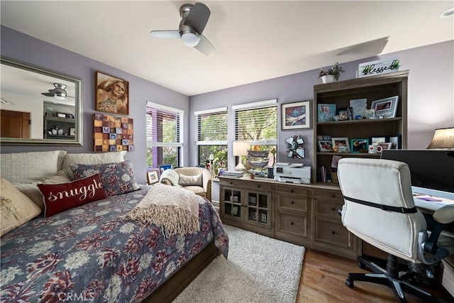 8300 San Diego Rd, Atascadero, CA 93422 - bedroom featuring a desk, wood finished floors, and a ceiling fan