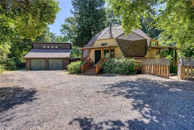8201 W W Side Potter Valley Rd, Potter Valley, CA 95469 - view of front of home featuring a gambrel roof, an outdoor structure, roof with shingles, and a detached garage