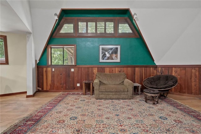 8201 W W Side Potter Valley Rd, Potter Valley, CA 95469 - living area with wood finished floors, healthy amount of natural light, wainscoting, and wooden walls