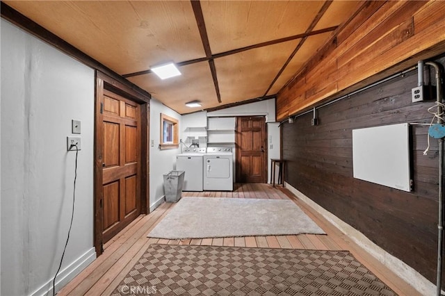 8201 W W Side Potter Valley Rd, Potter Valley, CA 95469 - washroom with independent washer and dryer, wooden walls, and light wood-style flooring