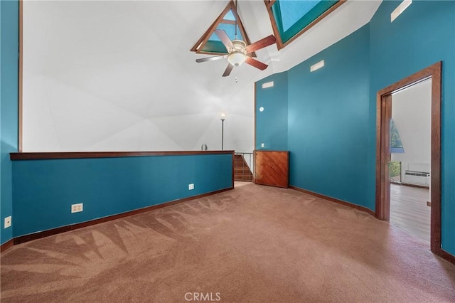 8201 W W Side Potter Valley Rd, Potter Valley, CA 95469 - spare room with carpet flooring, a ceiling fan, a baseboard radiator, and high vaulted ceiling