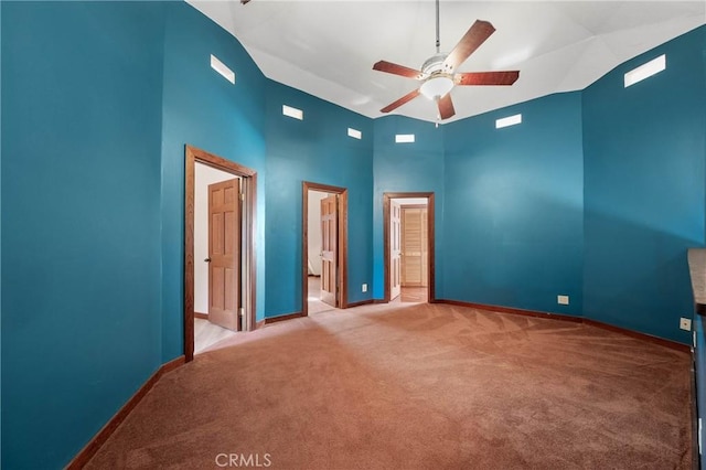 8201 W W Side Potter Valley Rd, Potter Valley, CA 95469 - unfurnished bedroom with carpet, a towering ceiling, ensuite bath, and ceiling fan