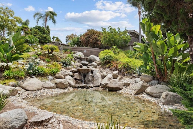 155 Rosebay Dr Unit 31, Encinitas, CA 92024 - view of yard featuring a garden pond