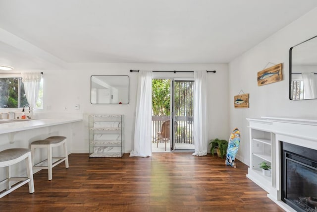 155 Rosebay Dr Unit 31, Encinitas, CA 92024 - living area with wood finished floors and a glass covered fireplace