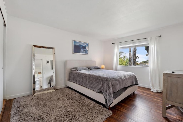 155 Rosebay Dr Unit 31, Encinitas, CA 92024 - bedroom with dark wood finished floors and baseboards