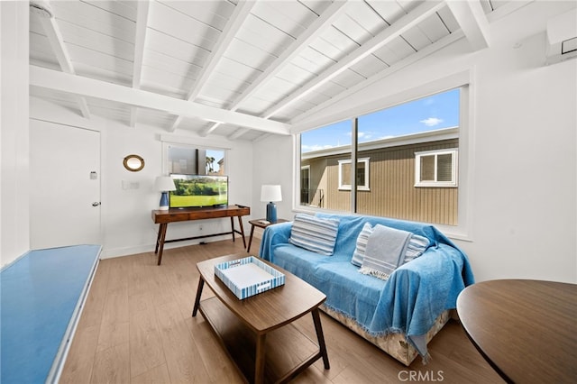 1924 W Oceanfront, Newport Beach, CA 92663 - living area with wood finished floors, beamed ceiling, and a wall mounted AC