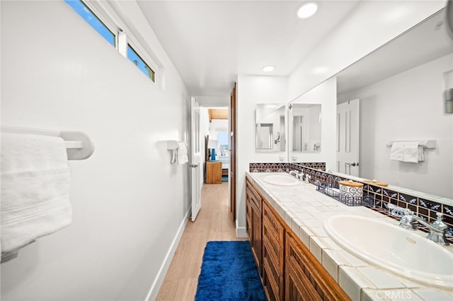 1924 W Oceanfront, Newport Beach, CA 92663 - full bathroom featuring double vanity, wood finished floors, and recessed lighting