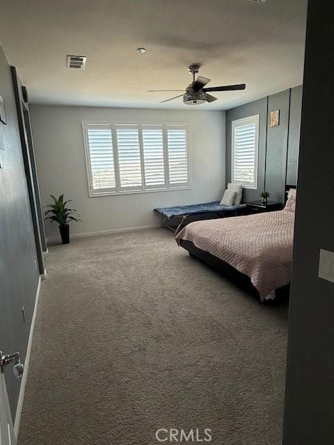 16009 Pitzer St, Fontana, CA 92336 - carpeted bedroom featuring baseboards and a ceiling fan