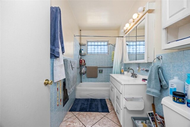 1258 N Ditman Ave, Los Angeles, CA 90063 - full bathroom featuring tile patterned floors, shower / tub combo, vanity, and a fireplace