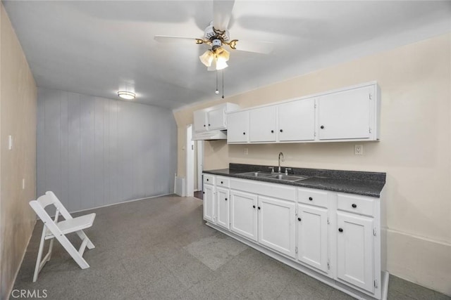 1258 N Ditman Ave, Los Angeles, CA 90063 - kitchen with white cabinets and a ceiling fan