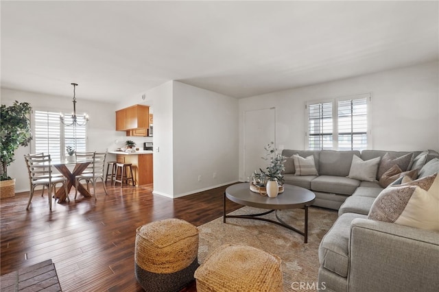4809 Fieldbrook Ln, Cypress, CA 90630 - living room featuring dark wood-style floors and a chandelier
