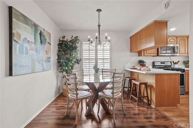 4809 Fieldbrook Ln, Cypress, CA 90630 - dining room featuring dark wood-style flooring and a chandelier