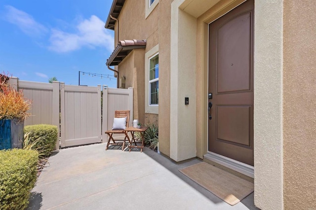 3002 Villeta Ave, Carlsbad, CA 92010 - view of exterior entry featuring stucco siding and a patio