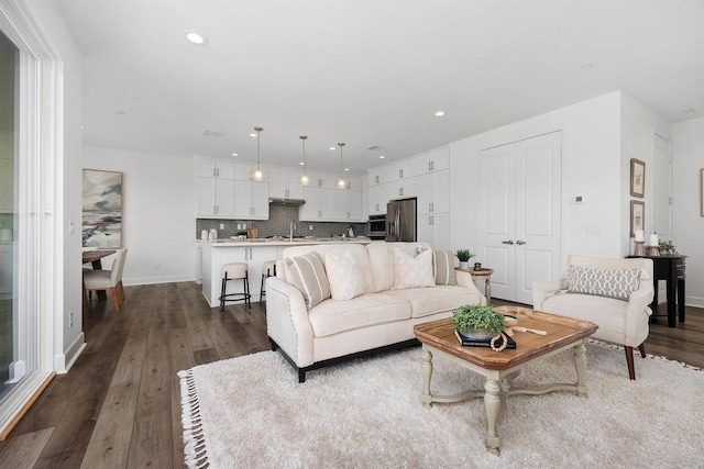 3002 Villeta Ave, Carlsbad, CA 92010 - living area with dark wood finished floors and recessed lighting