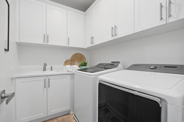 3002 Villeta Ave, Carlsbad, CA 92010 - laundry room with washing machine and clothes dryer and cabinet space