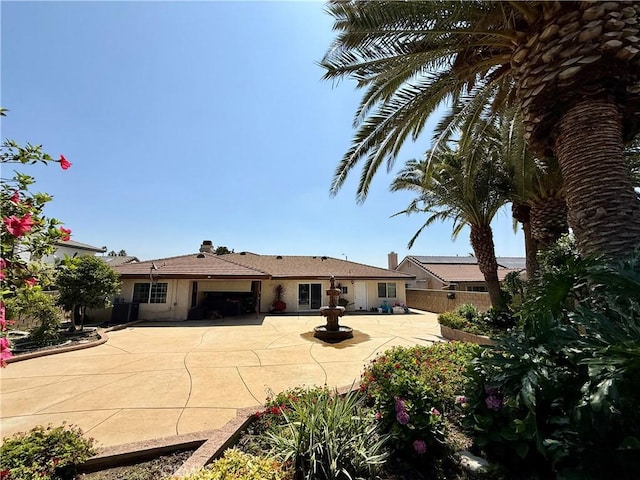 9150 Boxwood Ave, Fontana, CA 92335 - back of property featuring a patio area