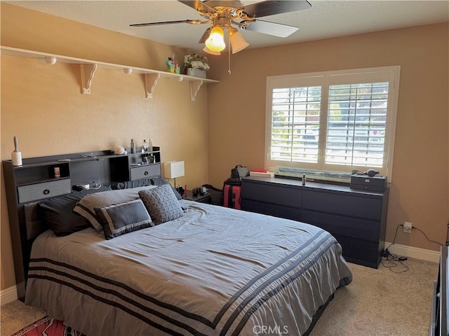 9150 Boxwood Ave, Fontana, CA 92335 - carpeted bedroom featuring baseboards and a ceiling fan