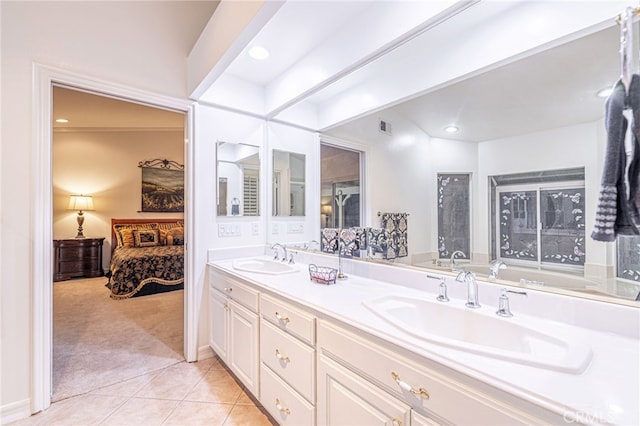 19809 Winged Foot Way, Porter Ranch, CA 91326 - ensuite bathroom with double vanity, tile patterned floors, and recessed lighting