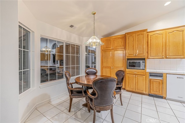 19809 Winged Foot Way, Porter Ranch, CA 91326 - dining space with a chandelier, lofted ceiling, and light tile patterned flooring