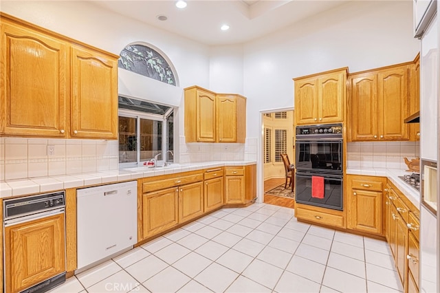 19809 Winged Foot Way, Porter Ranch, CA 91326 - kitchen featuring white dishwasher, decorative backsplash, light tile patterned flooring, recessed lighting, and a high ceiling