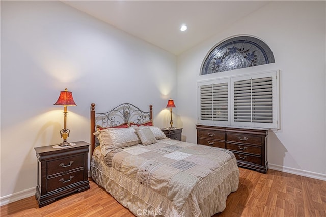 19809 Winged Foot Way, Porter Ranch, CA 91326 - bedroom featuring lofted ceiling and light wood-style floors
