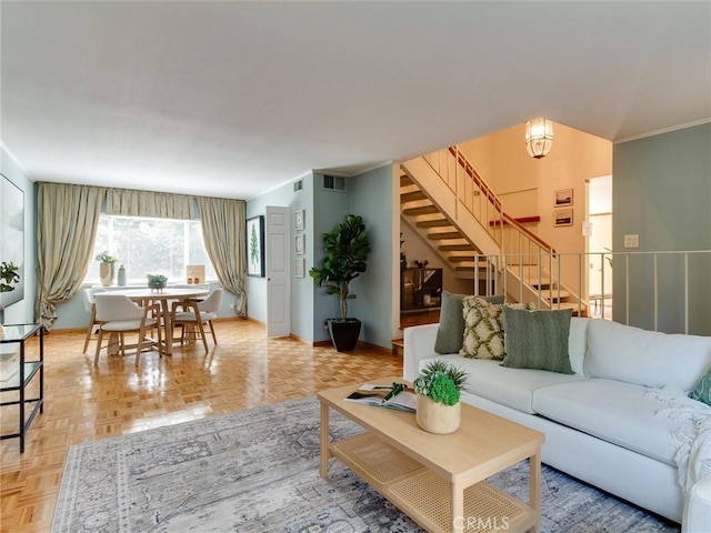 9386 Cambridge St, Cypress, CA 90630 - living room featuring stairway and crown molding