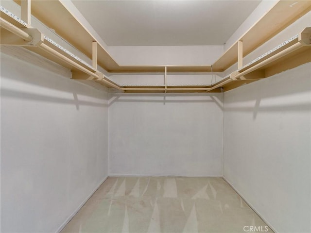 9386 Cambridge St, Cypress, CA 90630 - spacious closet featuring carpet flooring