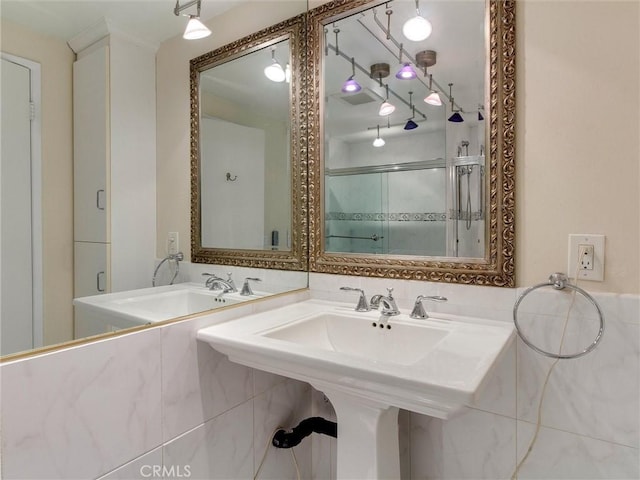9386 Cambridge St, Cypress, CA 90630 - bathroom with a sink and a shower with shower door