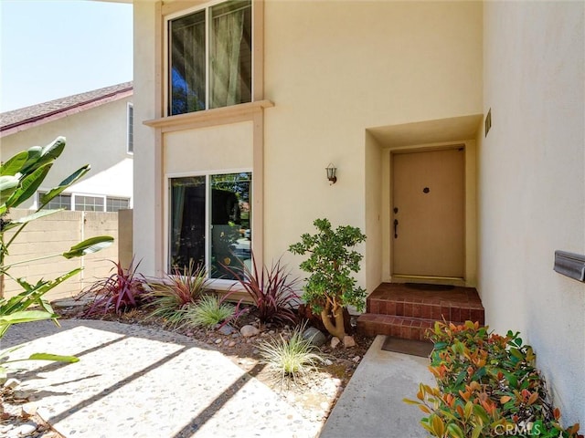 9386 Cambridge St, Cypress, CA 90630 - property entrance with stucco siding and a patio