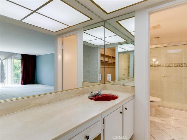 9386 Cambridge St, Cypress, CA 90630 - bathroom with tile patterned flooring, vanity, and a stall shower
