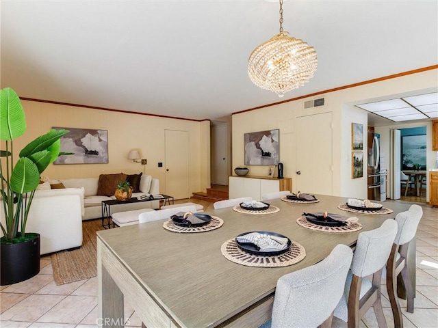 9386 Cambridge St, Cypress, CA 90630 - dining space featuring a chandelier, light tile patterned flooring, and crown molding