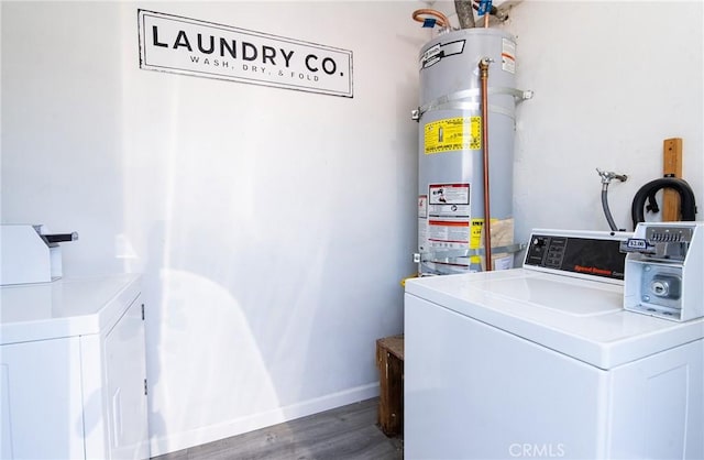 280 W S St, Rialto, CA 92376 - laundry room with washer and clothes dryer, strapped water heater, and wood finished floors