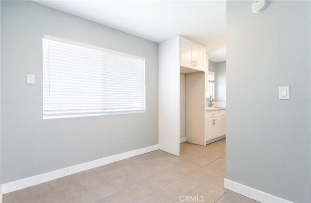 280 W S St, Rialto, CA 92376 - unfurnished room featuring a smoke detector and light tile patterned flooring