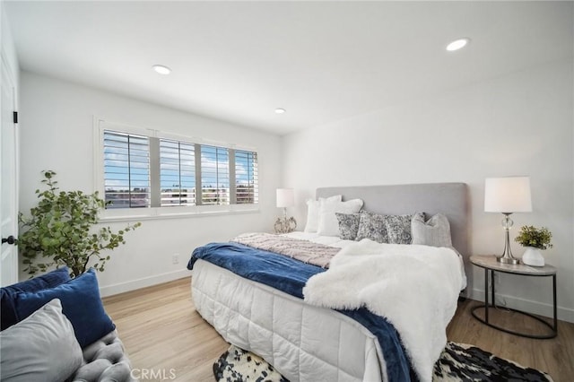19040 Celtic St, Porter Ranch, CA 91326 - bedroom featuring wood finished floors and recessed lighting