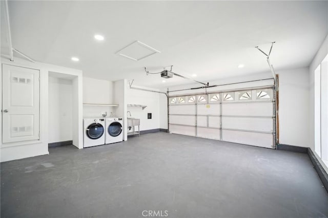 19040 Celtic St, Porter Ranch, CA 91326 - garage with washer and dryer, a garage door opener, and recessed lighting