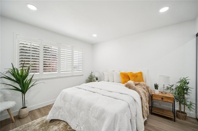 19040 Celtic St, Porter Ranch, CA 91326 - bedroom featuring wood finished floors and recessed lighting