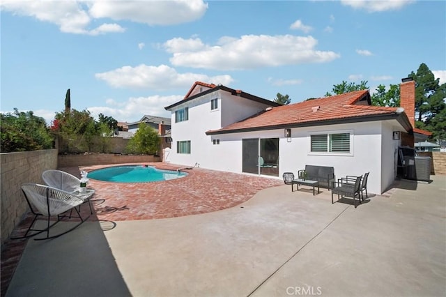 19040 Celtic St, Porter Ranch, CA 91326 - view of swimming pool with a patio area and an outdoor living space
