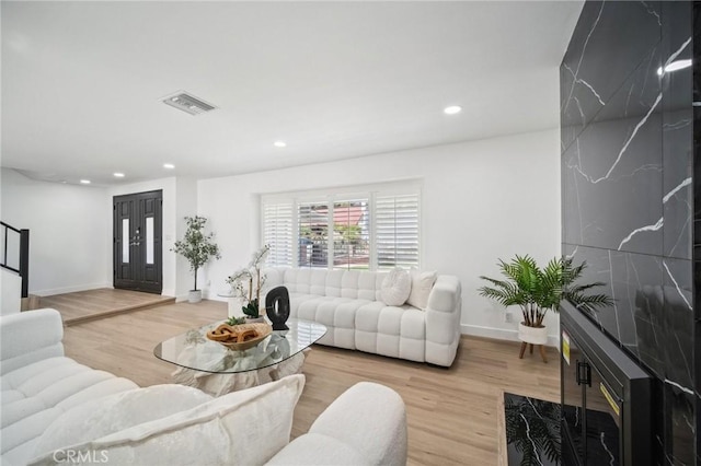 19040 Celtic St, Porter Ranch, CA 91326 - living room with recessed lighting and wood finished floors