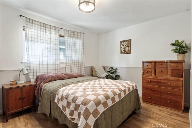 330 Spruce St, Riverside, CA 92507 - bedroom with wainscoting and light wood-type flooring