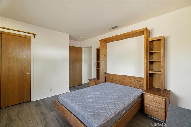 8140 Sherwood Blvd, Los Molinos, CA 96055 - bedroom with dark wood-style floors and baseboards