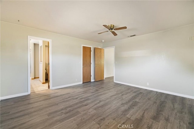 8140 Sherwood Blvd, Los Molinos, CA 96055 - unfurnished bedroom with wood finished floors and ceiling fan