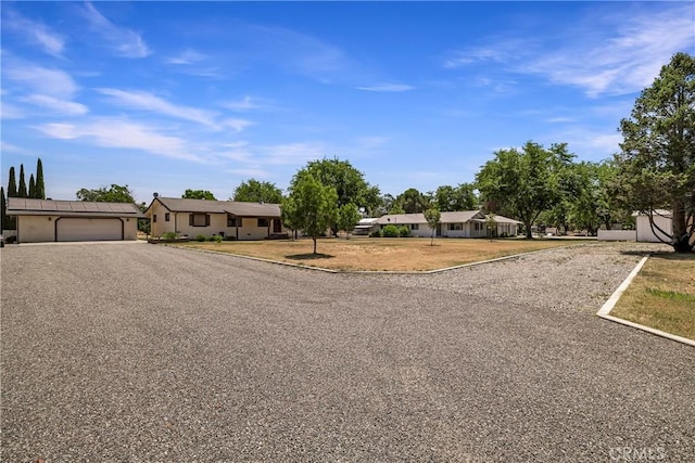 8140 Sherwood Blvd, Los Molinos, CA 96055 - ranch-style home featuring gravel driveway