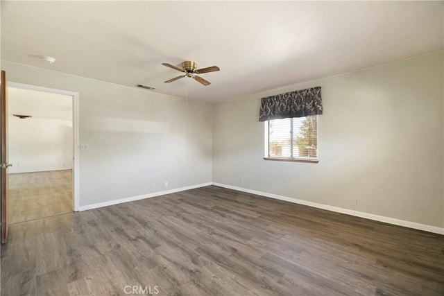 8140 Sherwood Blvd, Los Molinos, CA 96055 - unfurnished room featuring a ceiling fan, wood finished floors, and a smoke detector