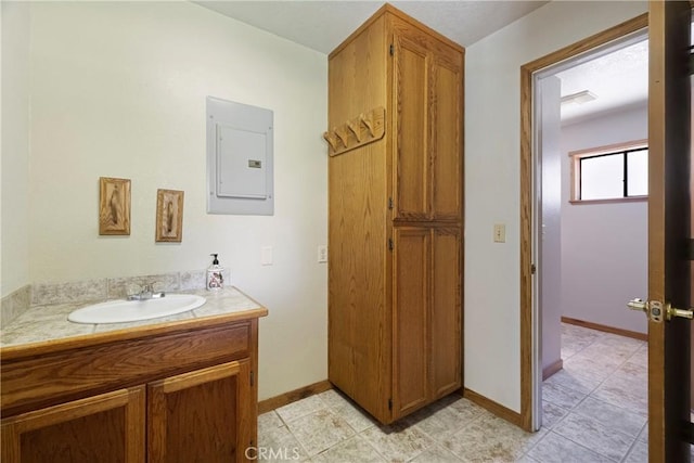 8140 Sherwood Blvd, Los Molinos, CA 96055 - bathroom featuring electric panel, vanity, and tile patterned floors