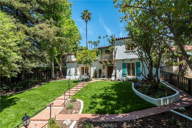 611 E Mountain St, Glendale, CA 91207 - rear view of house with a balcony and stucco siding