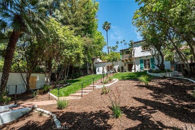 611 E Mountain St, Glendale, CA 91207 - fenced yard featuring a balcony