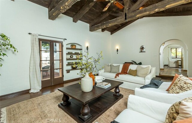 611 E Mountain St, Glendale, CA 91207 - living room with arched walkways, a ceiling fan, wood finished floors, french doors, and a wood ceiling with exposed beams