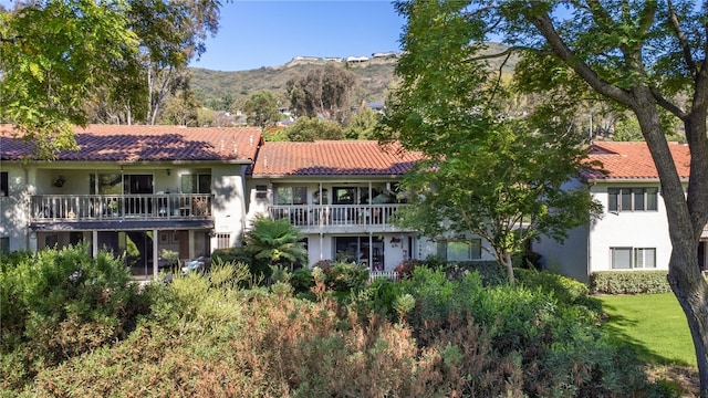 31214 W Nine Dr, Laguna Niguel, CA 92677 - back of house featuring a tile roof, stucco siding, and a mountain view