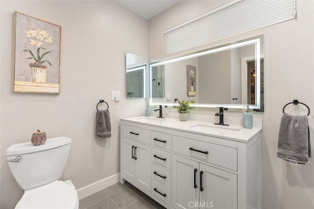 6207 Capistrano Ave, Woodland Hills, CA 91367 - bathroom featuring double vanity and tile patterned flooring
