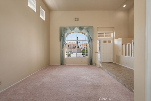 15280 Dunes Way, Moreno Valley, CA 92555 - foyer entrance featuring carpet flooring and healthy amount of natural light